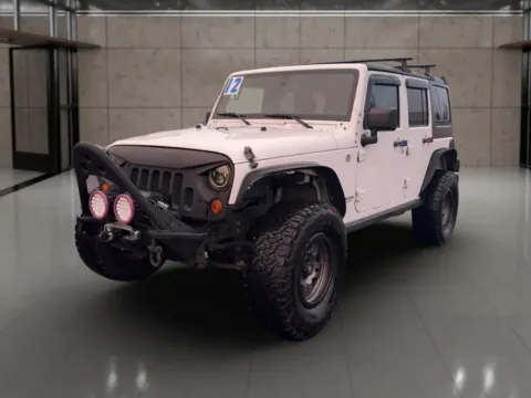 Black 2012 Jeep Wrangler Unlimited Rubicon Sport Utility 4D for sale in Dallas, OR
