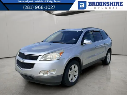 Silver 2011 Chevrolet Traverse LT w/1LT for sale in Irving, TX