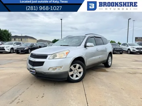 Silver 2011 Chevrolet Traverse LT w/1LT for sale in Irving, TX