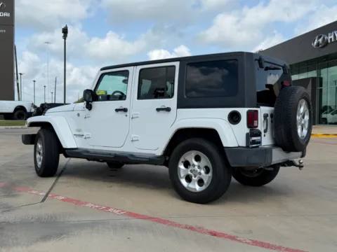 Another view of 2014 Jeep Wrangler Sahara for sale in Irving, TX at Dallas Direct Auto