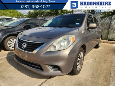 Silver 2014 Nissan Versa SV for sale in Irving, TX