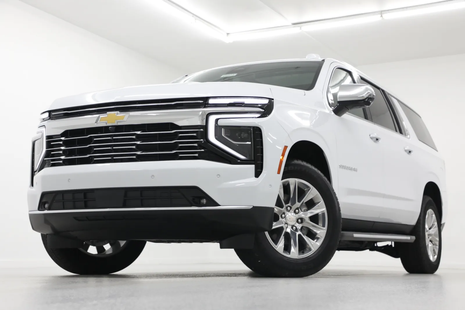 White 2026 Chevrolet Suburban Premier for sale in Clinton, MO