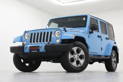 Blue 2017 Jeep Wrangler Unlimited Sahara for sale in Clinton, MO