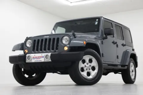 Gray 2014 Jeep Wrangler Unlimited Sahara for sale in Clinton, MO