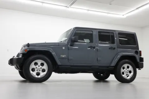 Photos of 2014 Jeep Wrangler Unlimited Sahara for sale in Clinton, MO at Jim Falk Motors