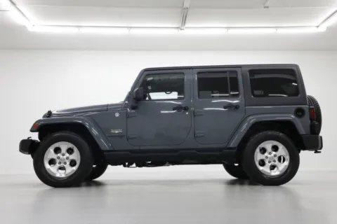 Another view of 2014 Jeep Wrangler Unlimited Sahara for sale in Clinton, MO at Jim Falk Motors