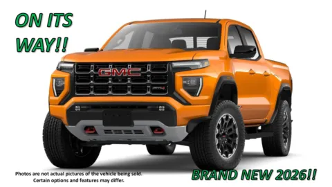 Orange 2026 GMC Canyon 4WD AT4 for sale in Clinton, MO