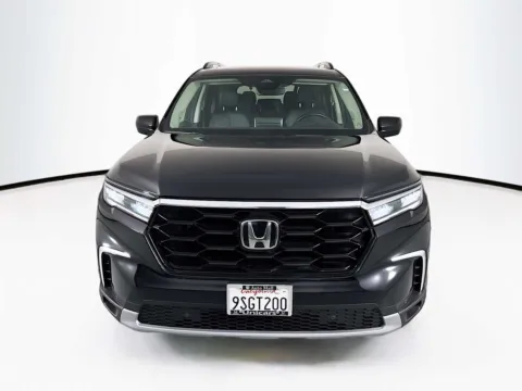 Photos of 2025 Honda Pilot Touring+ for sale in Indio, CA at Unicars Honda