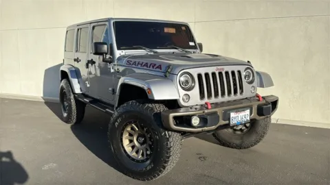 Silver 2016 Jeep Wrangler Unlimited Sahara for sale in Indio, CA
