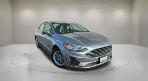 Silver 2020 Ford Fusion Hybrid SE for sale in Indio, CA