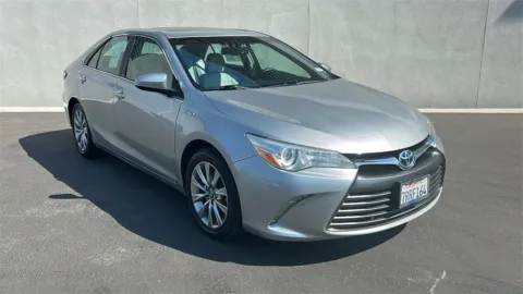 Silver 2016 Toyota Camry Hybrid for sale in Indio, CA
