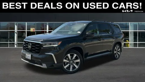 Photos of 2023 Honda Pilot Touring for sale in Indio, CA at Fiesta Kia