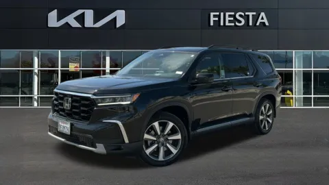 Photos of 2023 Honda Pilot Touring for sale in Indio, CA at Fiesta Kia
