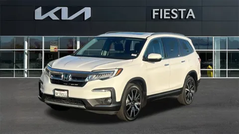 Photos of 2022 Honda Pilot Touring for sale in Indio, CA at Fiesta Kia