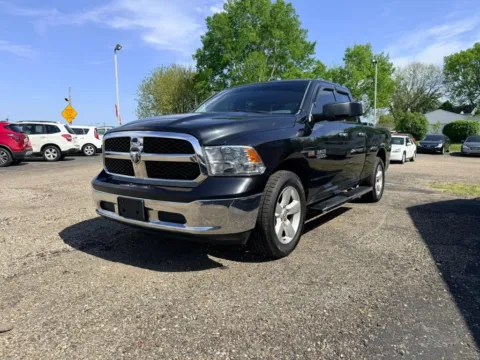 Another view of 2015 Ram 1500 Quad Cab SLT Pickup 4D 6 1/3 ft for sale in Lancaster, OH at Instant Auto Sales Lancaster