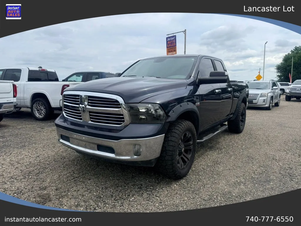 Black 2013 Ram 1500 Quad Cab SLT Pickup 4D 6 1/3 ft for sale in Lancaster, OH