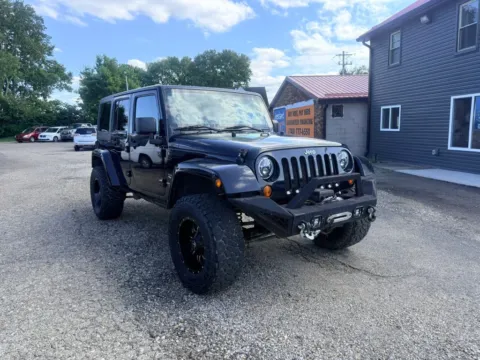 Another view of 2013 Jeep Wrangler Unlimited Sahara Sport Utility 4D for sale in Lancaster, OH at Instant Auto Sales Lancaster