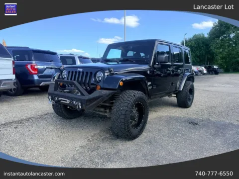 Black 2013 Jeep Wrangler Unlimited Sahara Sport Utility 4D for sale in Lancaster, OH