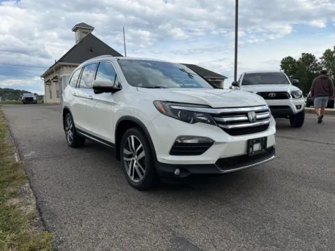 Another view of 2016 Honda Pilot Touring Sport Utility 4D for sale in Lancaster, OH at Instant Auto Sales Lancaster