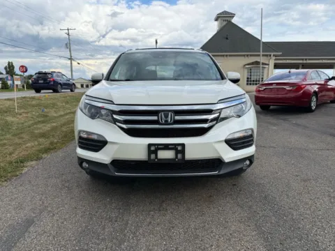 Photos of 2016 Honda Pilot Touring Sport Utility 4D for sale in Lancaster, OH at Instant Auto Sales Lancaster