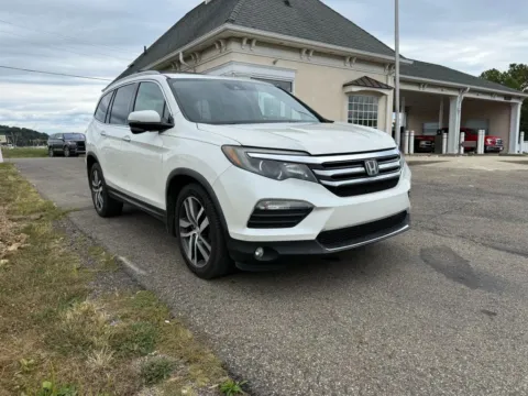 Another view of 2016 Honda Pilot Touring Sport Utility 4D for sale in Lancaster, OH at Instant Auto Sales Lancaster