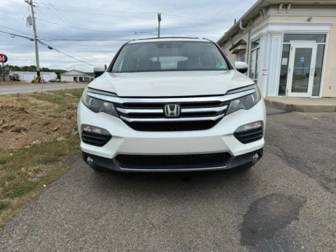 Photos of 2016 Honda Pilot Touring Sport Utility 4D for sale in Lancaster, OH at Instant Auto Sales Lancaster