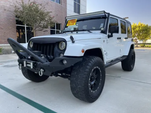 White 2015 Jeep Wrangler Unlimited Sport S 4WD for sale in Anaheim, CA