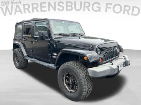 Silver 2009 Jeep Wrangler Unlimited Sahara for sale in Warrensburg, MO
