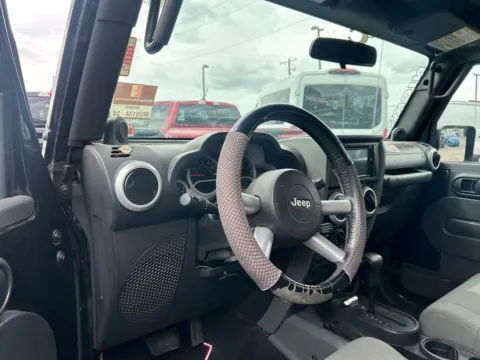 Photos of 2009 Jeep Wrangler Unlimited Sahara for sale in Warrensburg, MO at Warrensburg Ford