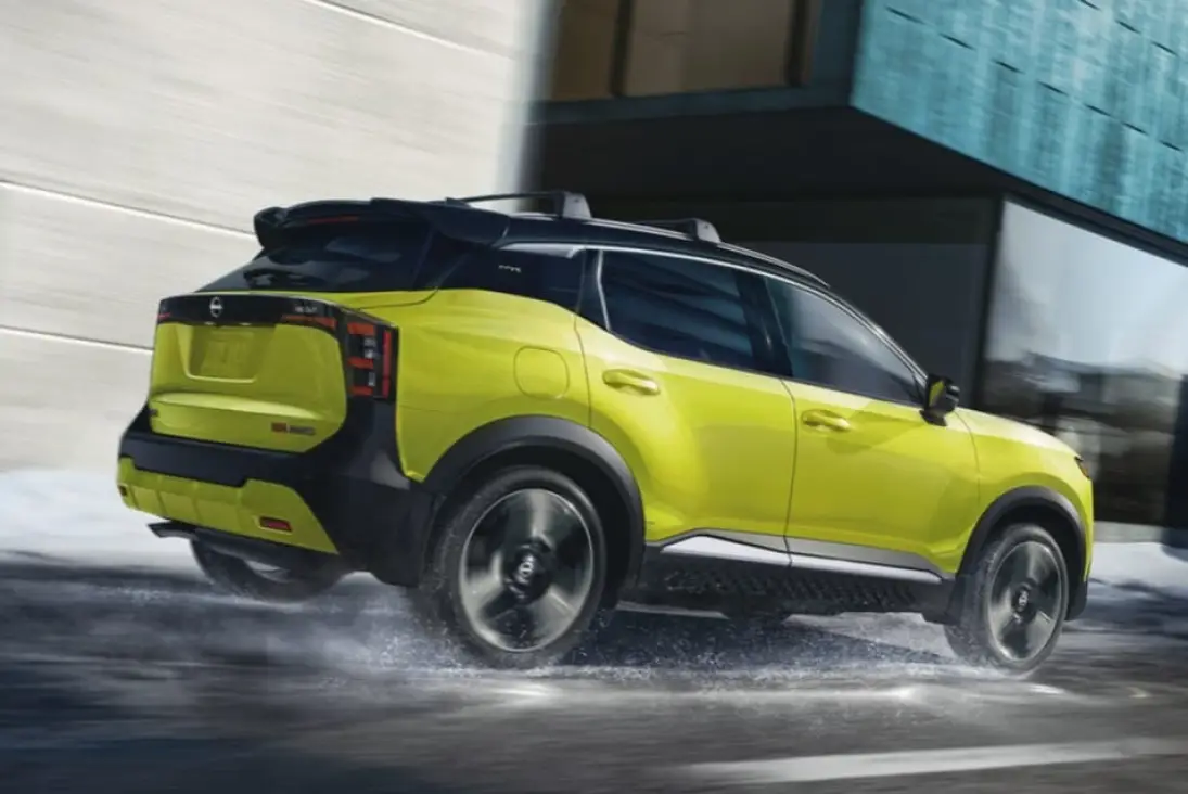Nissan Kicks driving through city streets