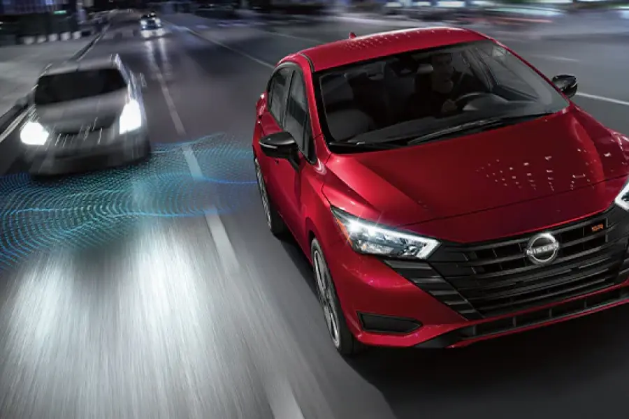 2025 Nissan Versa driving on a road